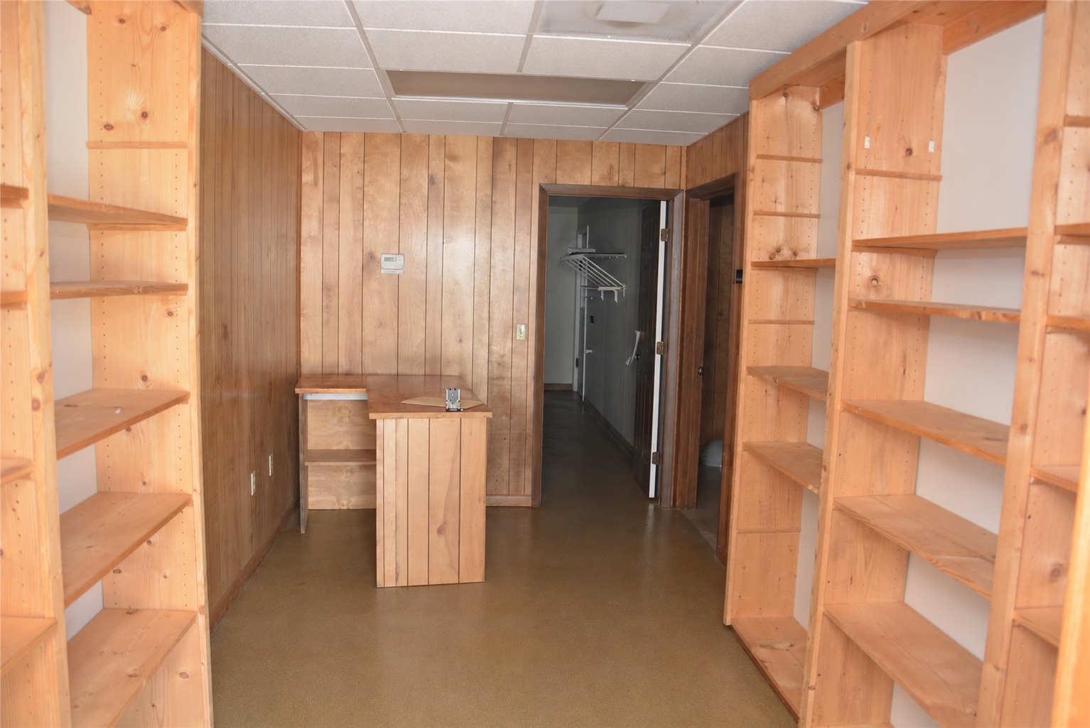 Built-in storage with shelving, as photographed